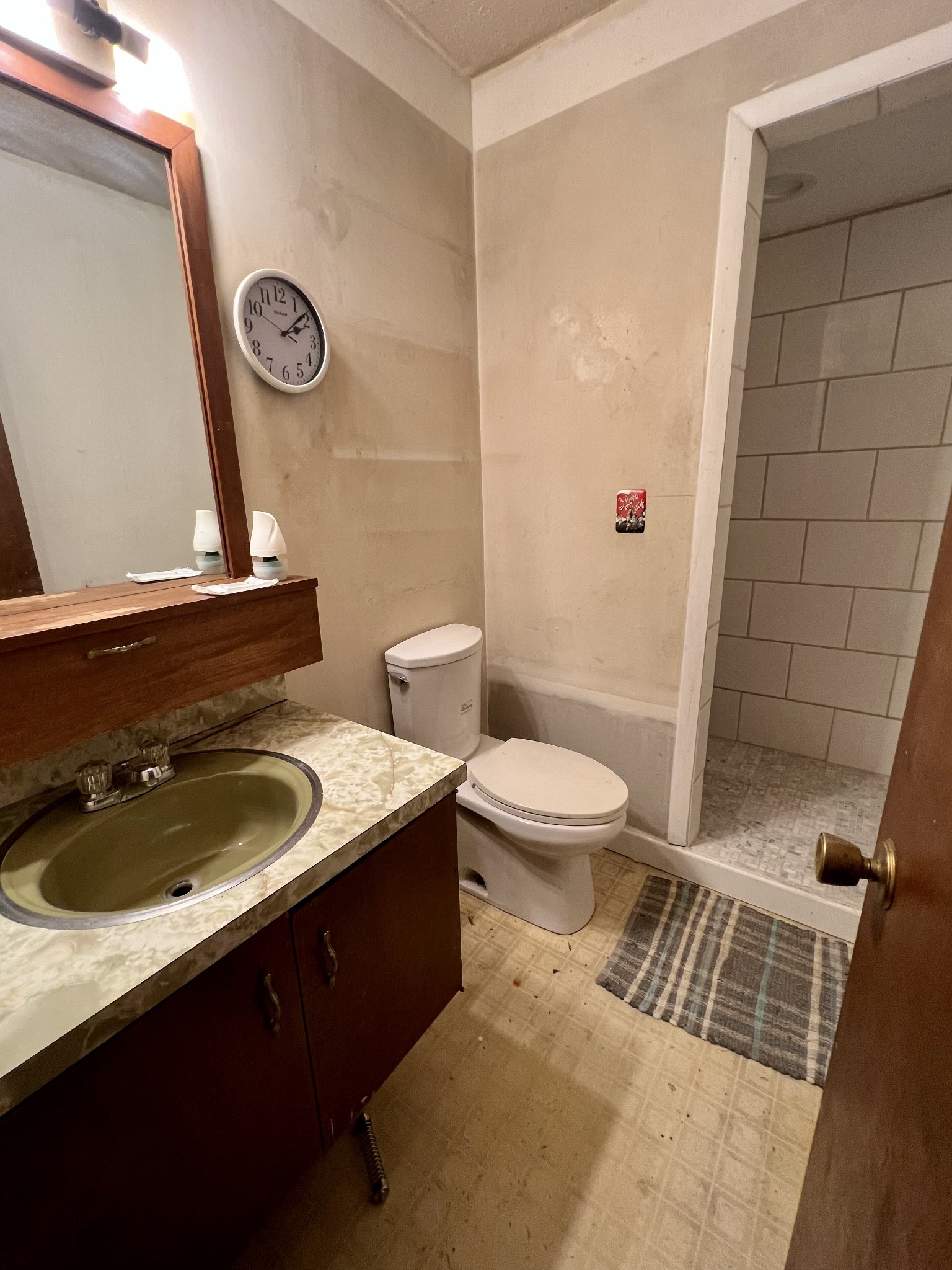 1097 Kennedy Road Manchester, TN 37355 - Photo 15 of 20 a bathroom with a sink a toilet and shower