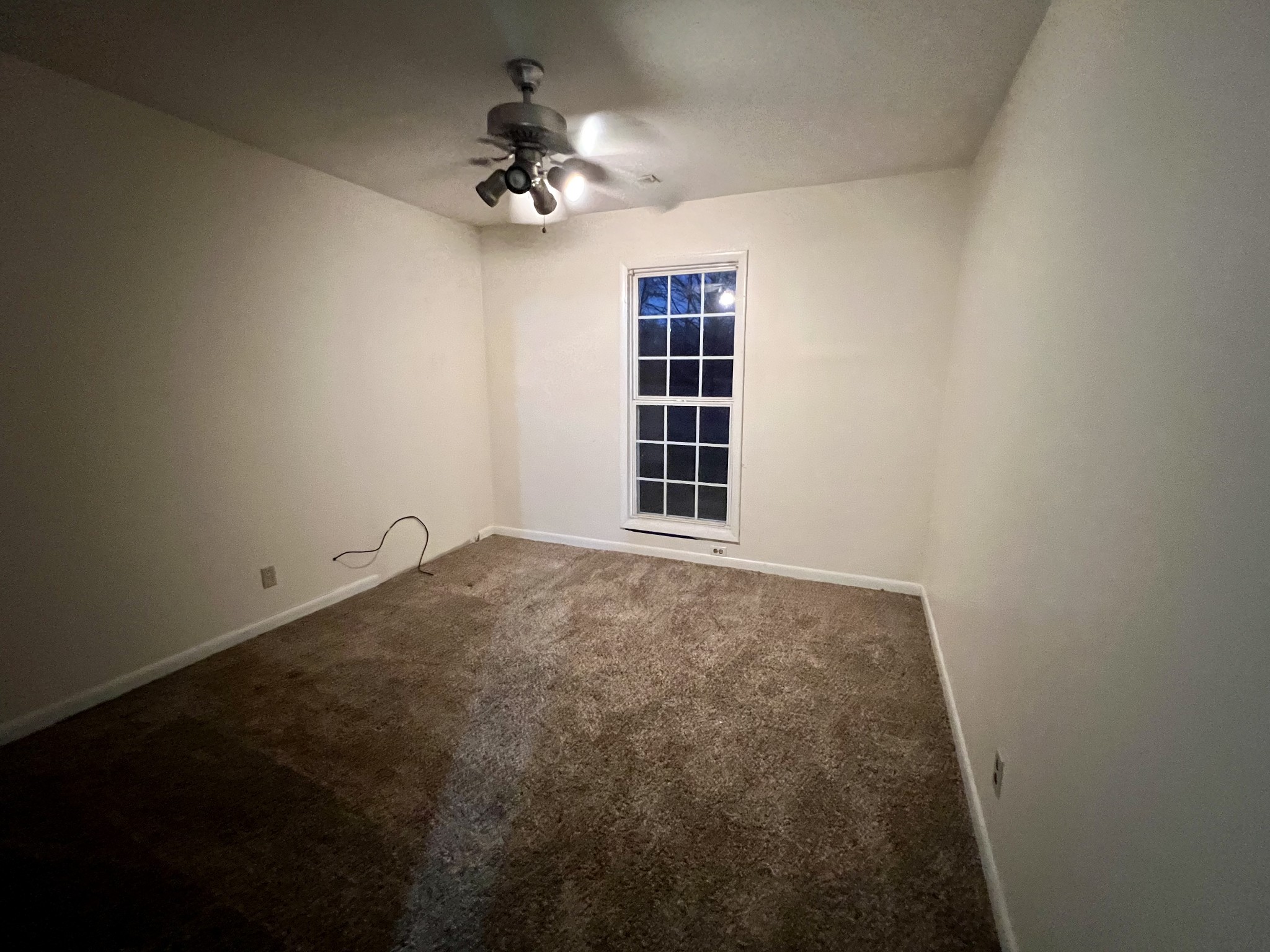 1097 Kennedy Road Manchester, TN 37355 - Photo 18 of 20 a view of an empty room with a window