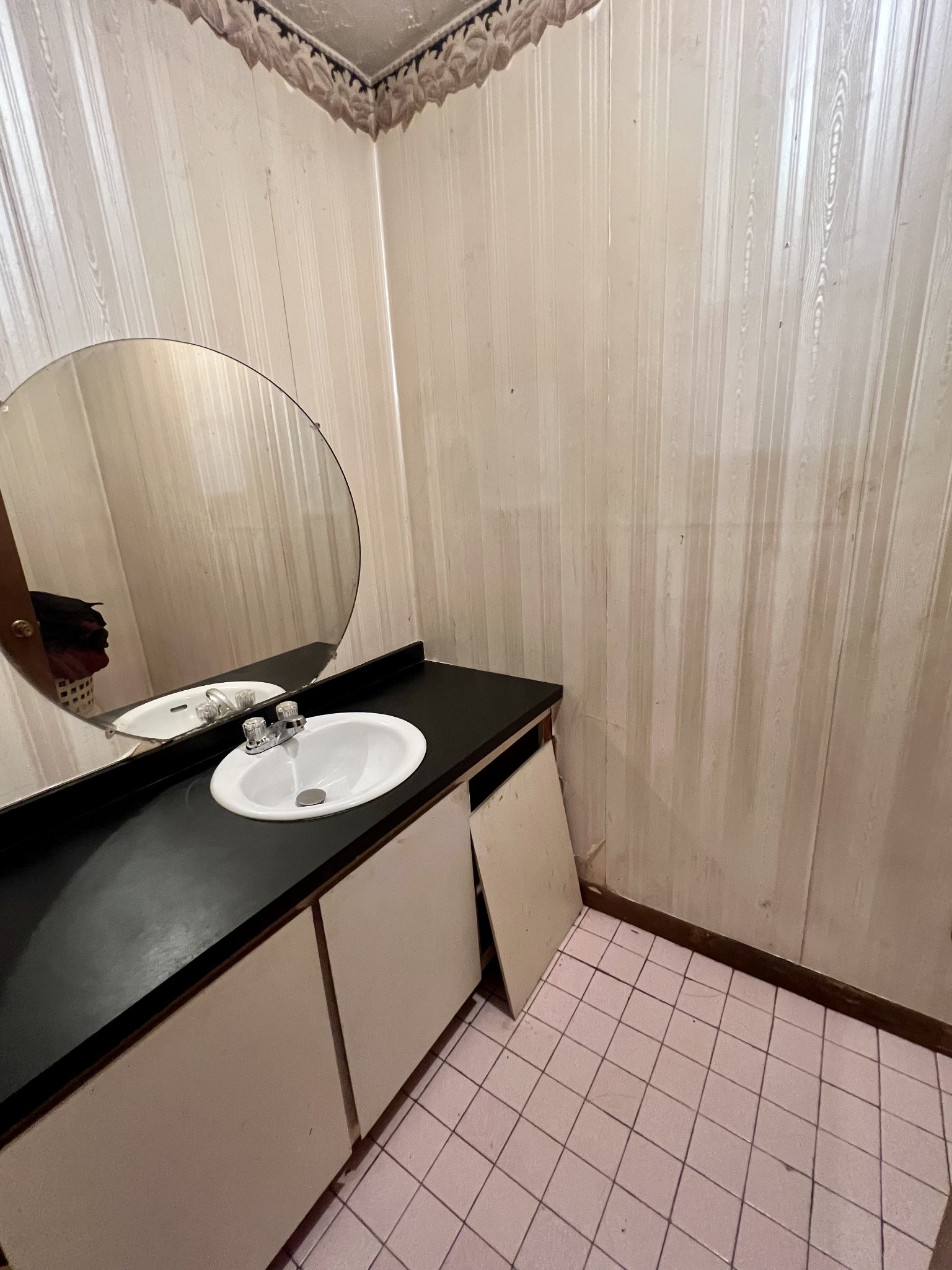 1097 Kennedy Road Manchester, TN 37355 - Photo 20 of 20 a bathroom with a sink and a mirror