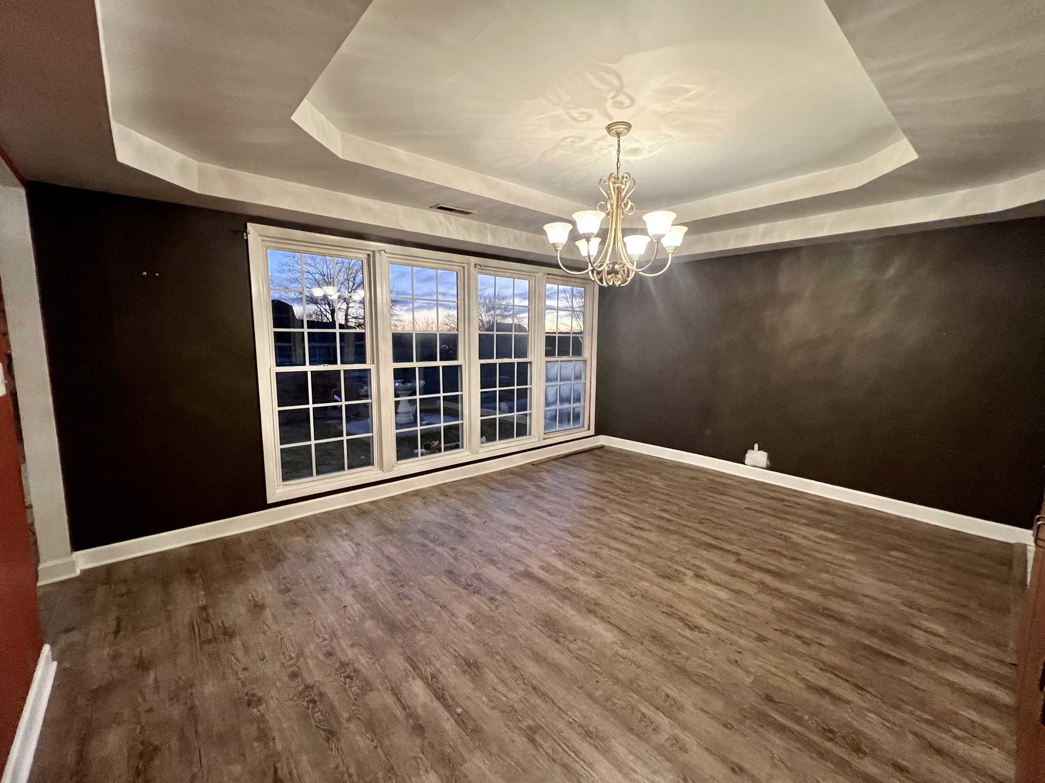 1097 Kennedy Road Manchester, TN 37355 - Photo 8 of 20 wooden floor in an empty room with a window