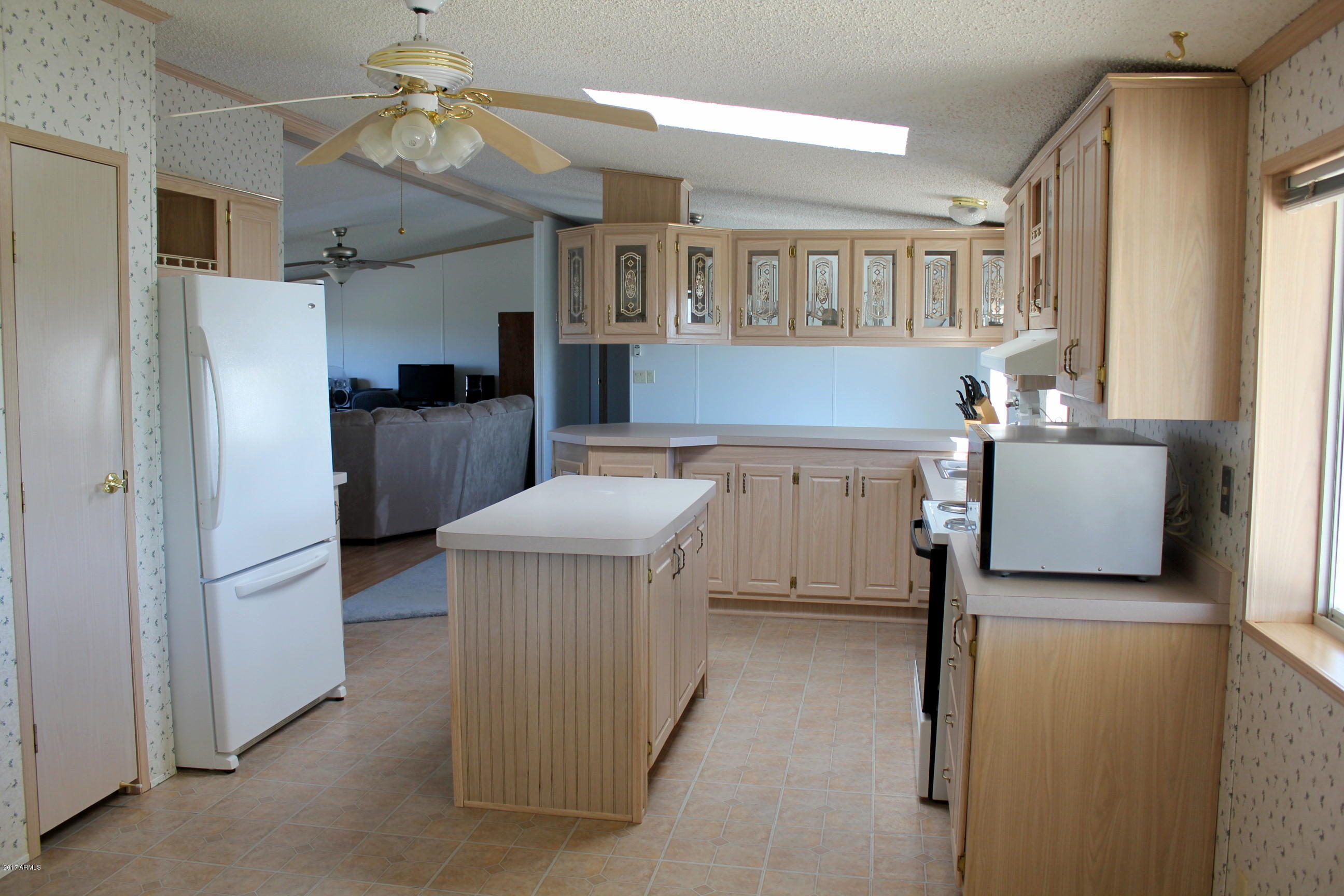 20837 West Cheyenne Road Buckeye, AZ 85326 - Photo 16 of 33 Peeking into the living room