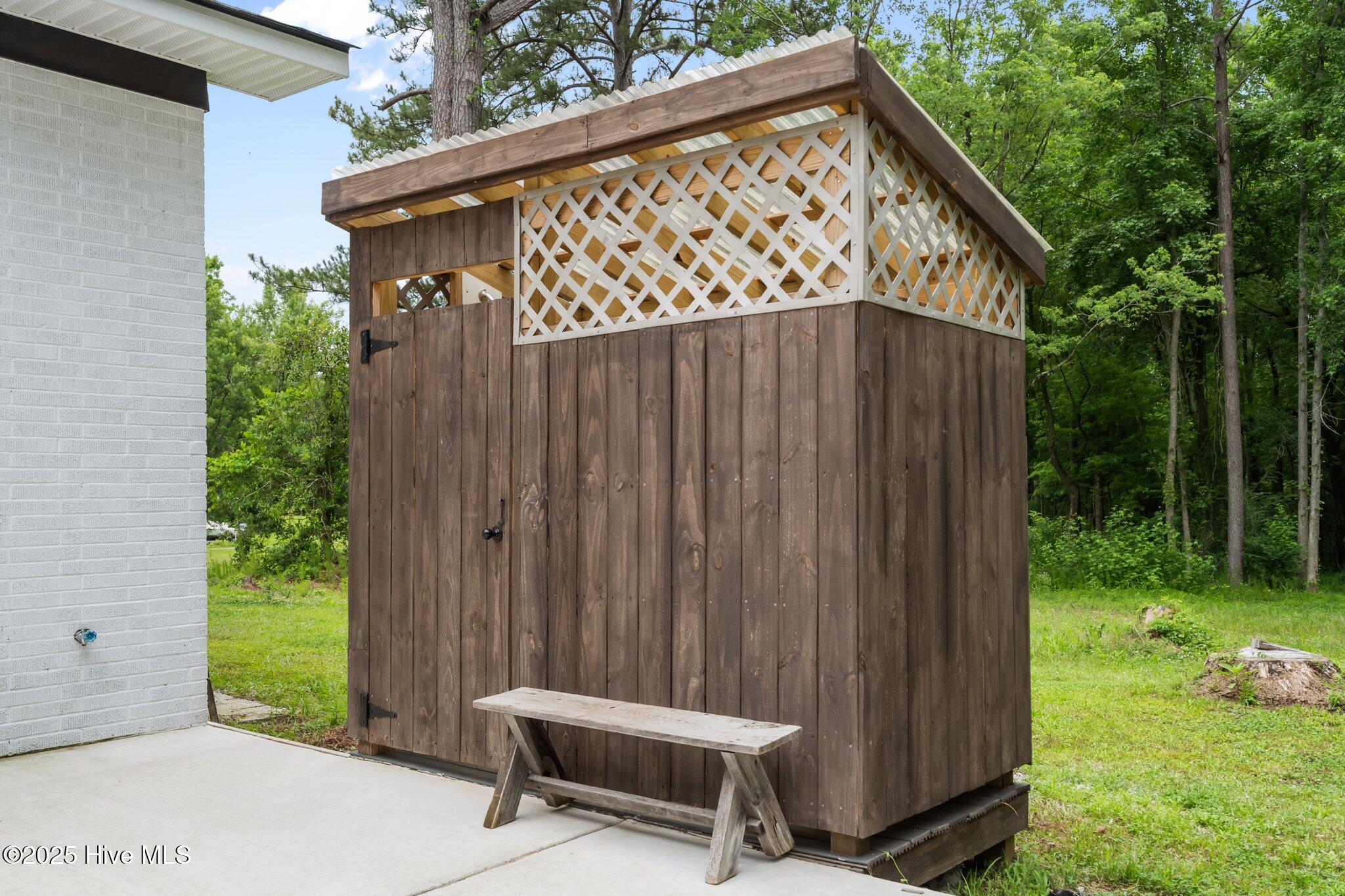 206 Justice Road Jacksonville, NC 28540 - Photo 6 of 29 outdoor shower off back patio
