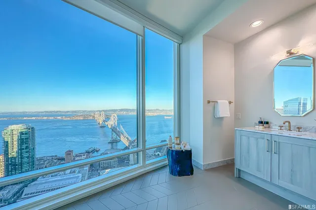 a view of a city with tall buildings