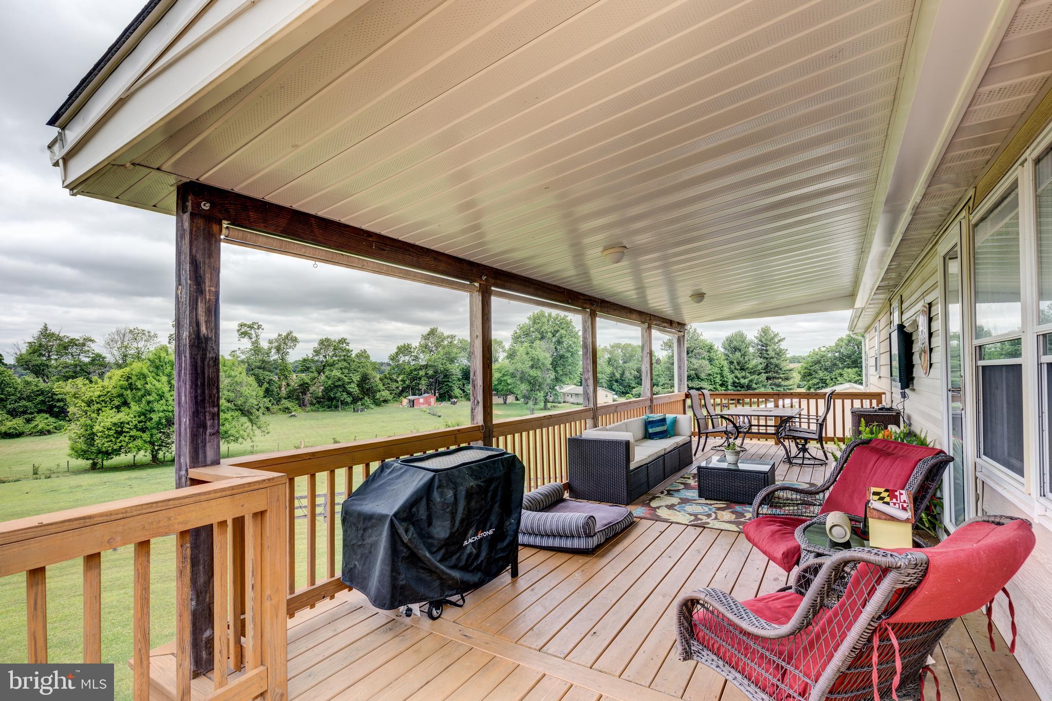 1436 Nicodemus Road New Windsor, MD 21776 - Photo 38 of 67 Back deck overlooks the pastures