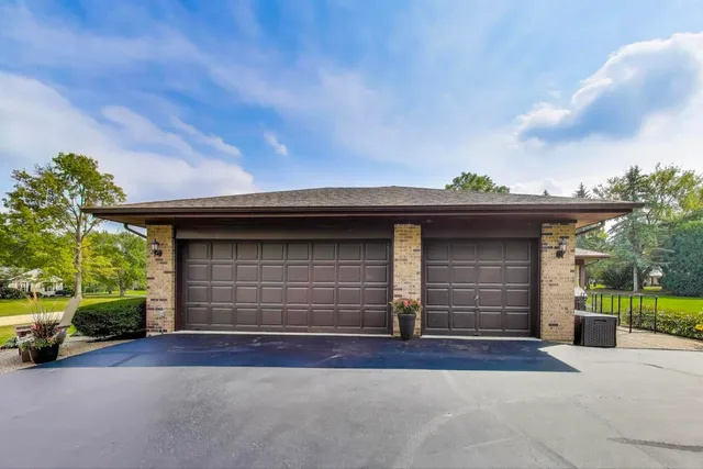 a house with garden in front of it