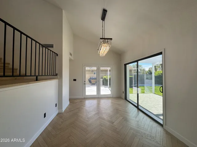 a bathroom with a sink mirror vanity and toilet