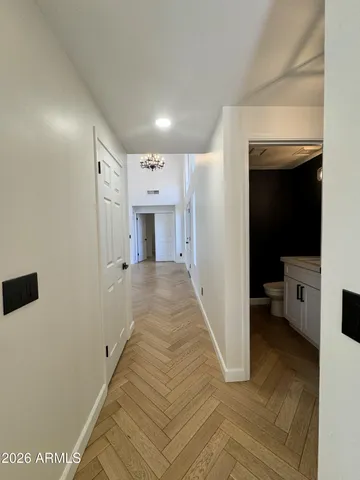 a bedroom with a bed and a fireplace