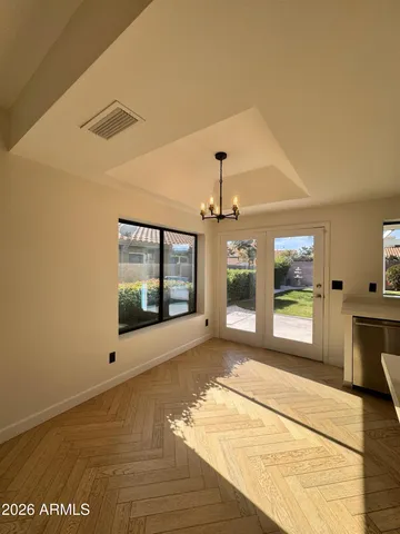 a bathroom with a bathtub shower sink vanity and toilet