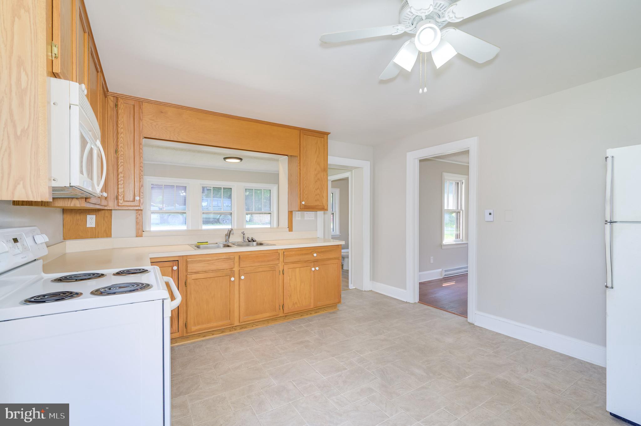 14 Peer Lane Berkeley Springs, WV 25411 - Photo 11 of 52 a large kitchen with kitchen island a sink stainless steel appliances and cabinets