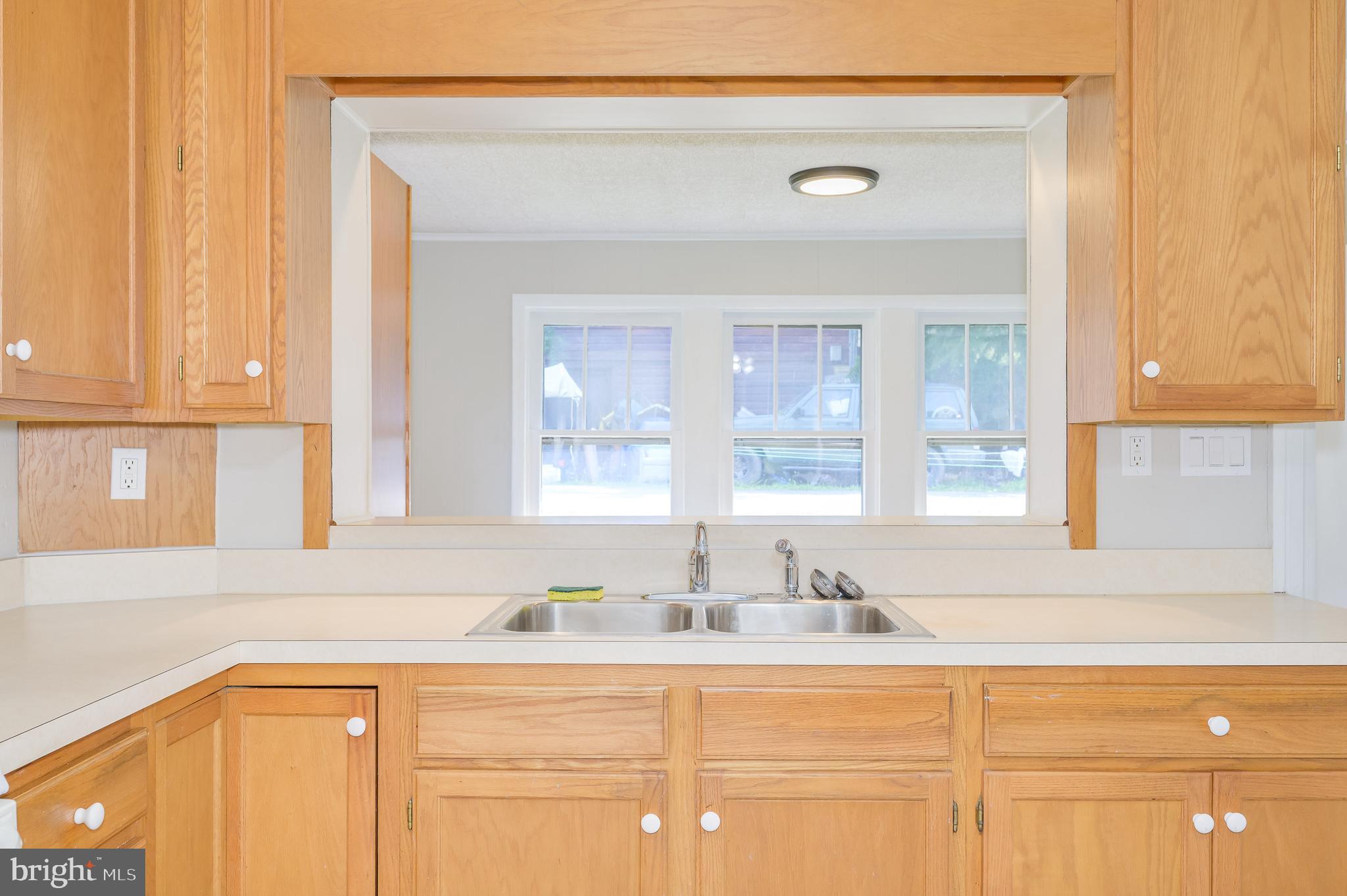 14 Peer Lane Berkeley Springs, WV 25411 - Photo 12 of 52 a bathroom with a sink and a mirror