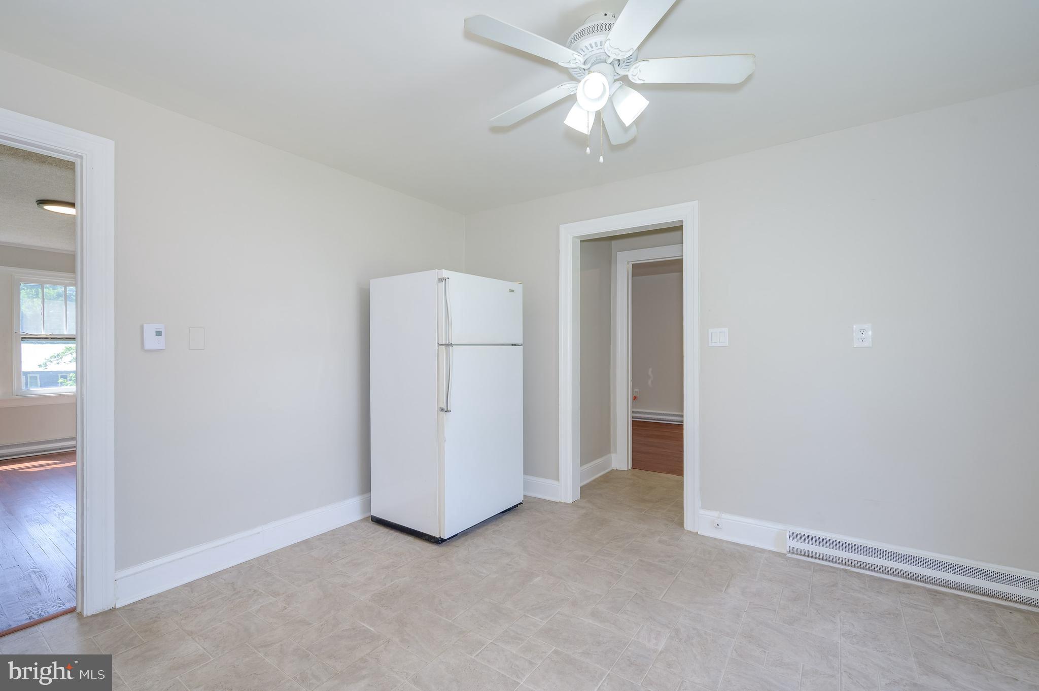 14 Peer Lane Berkeley Springs, WV 25411 - Photo 13 of 52 an empty room with a fan and a ceiling fan