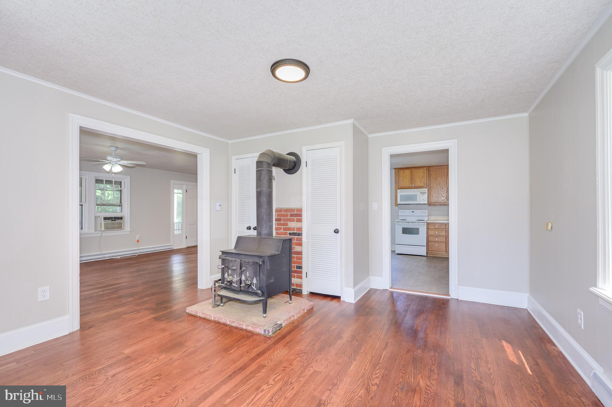 14 Peer Lane Berkeley Springs, WV 25411 - Photo 15 of 52 a living room with furniture and a wooden floor