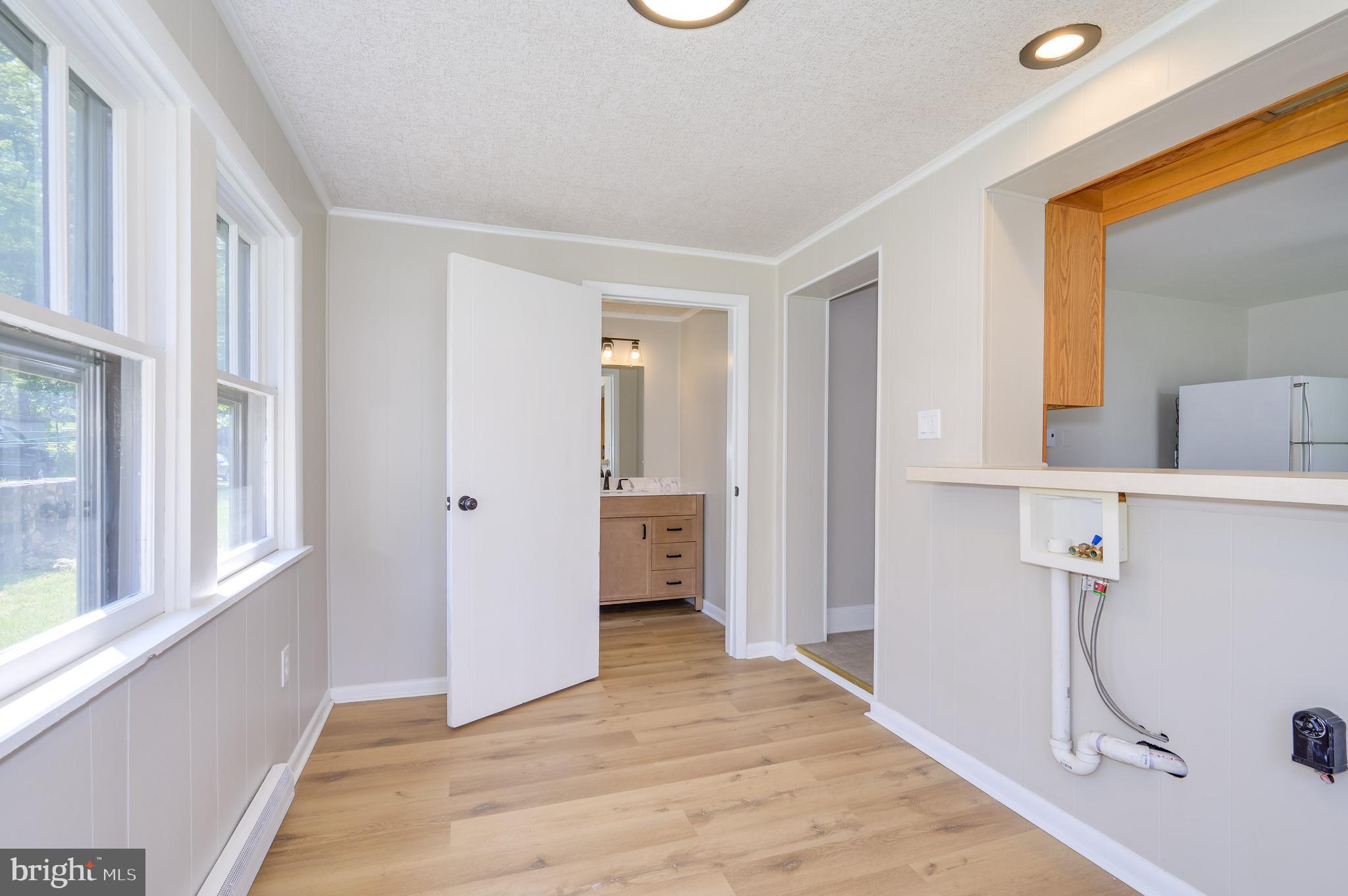 14 Peer Lane Berkeley Springs, WV 25411 - Photo 3 of 52 a view of a room with a sink and a window