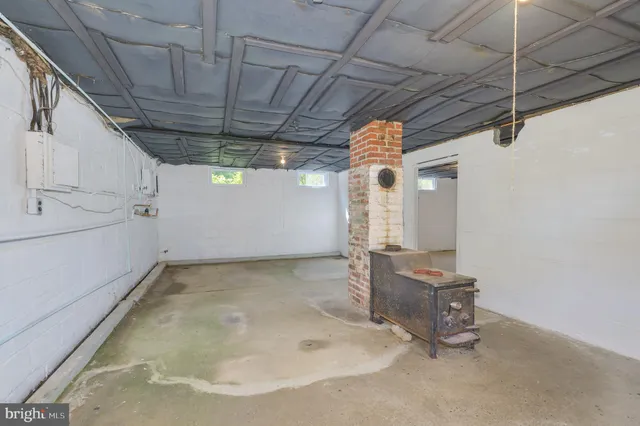 a view of a porch with wooden floor and outdoor space