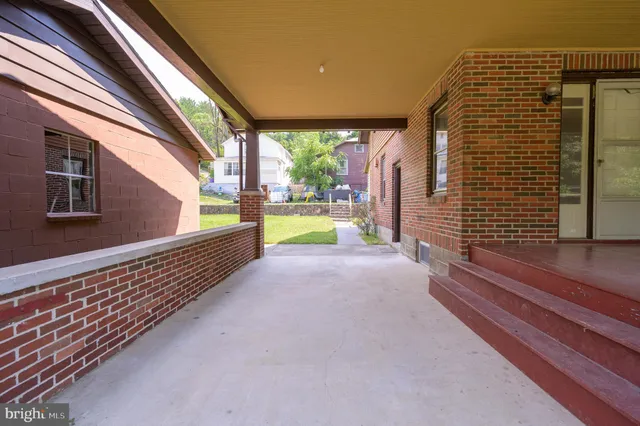 a yellow house with a outdoor view