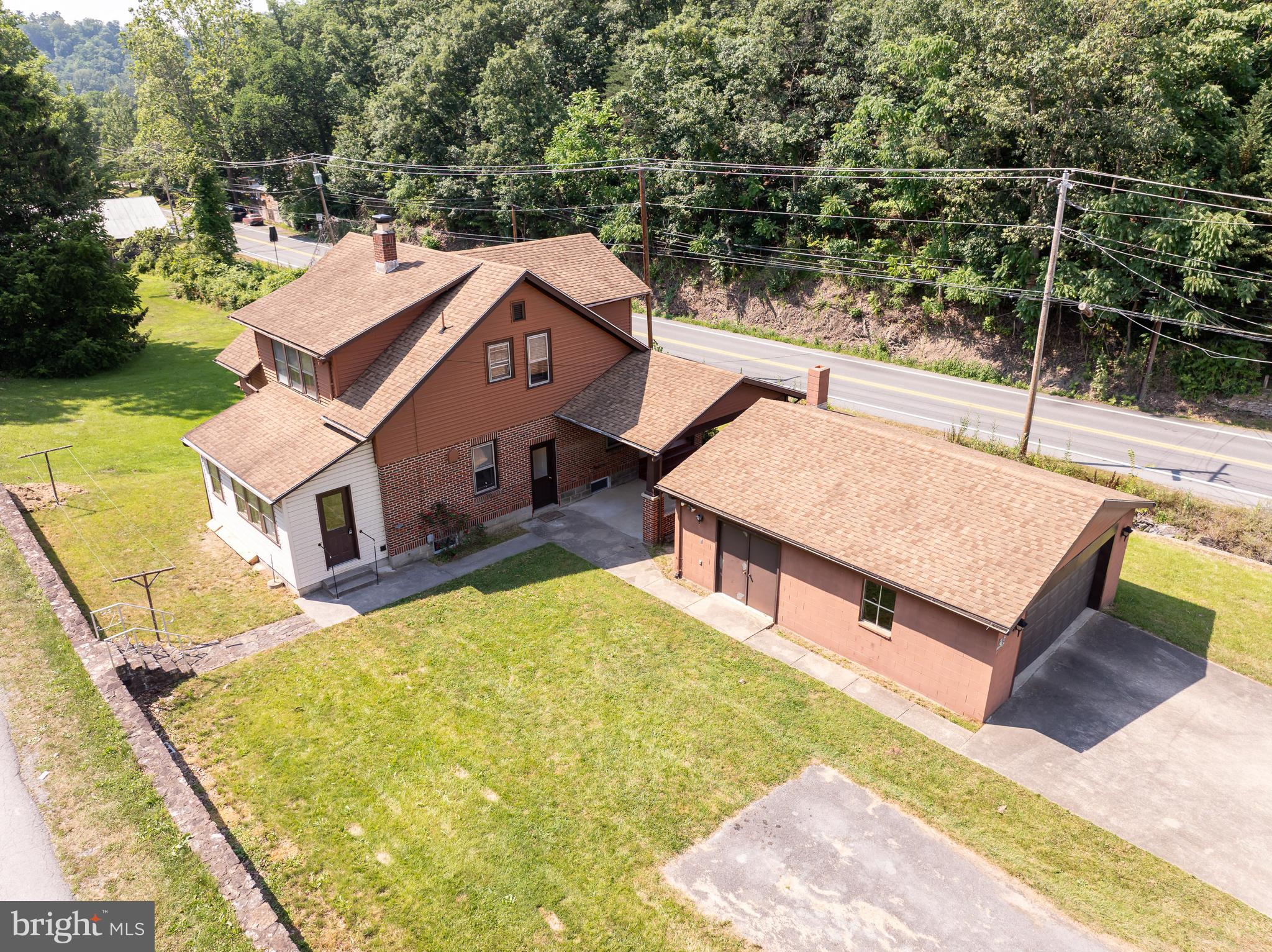 14 Peer Lane Berkeley Springs, WV 25411 - Photo 43 of 52 an aerial view of a house with swimming pool