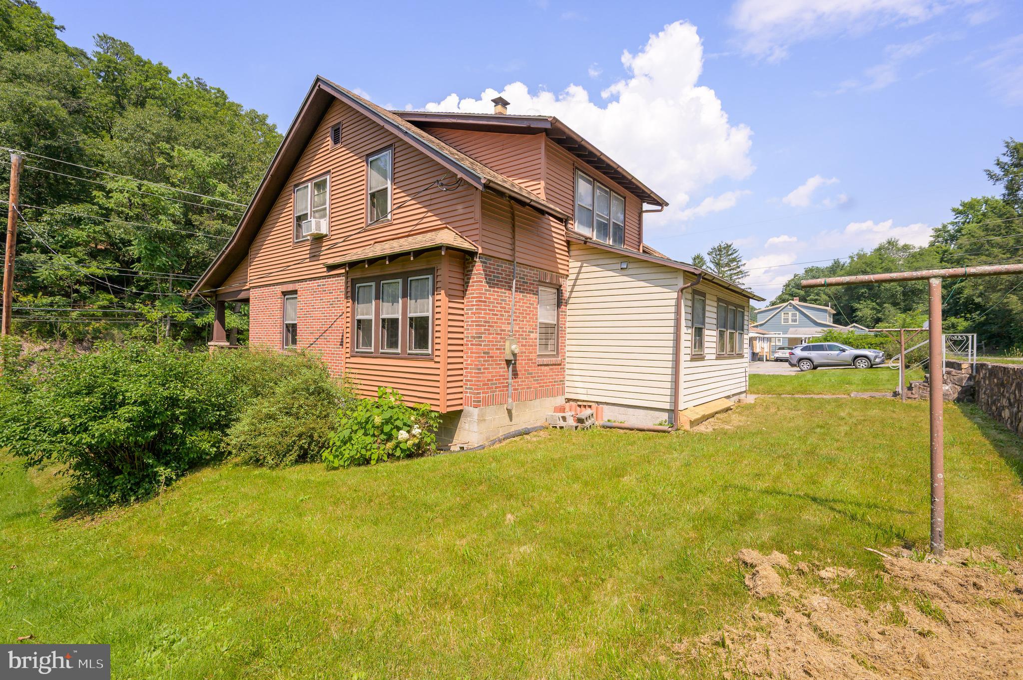 14 Peer Lane Berkeley Springs, WV 25411 - Photo 48 of 52 a view of a house with backyard and garden