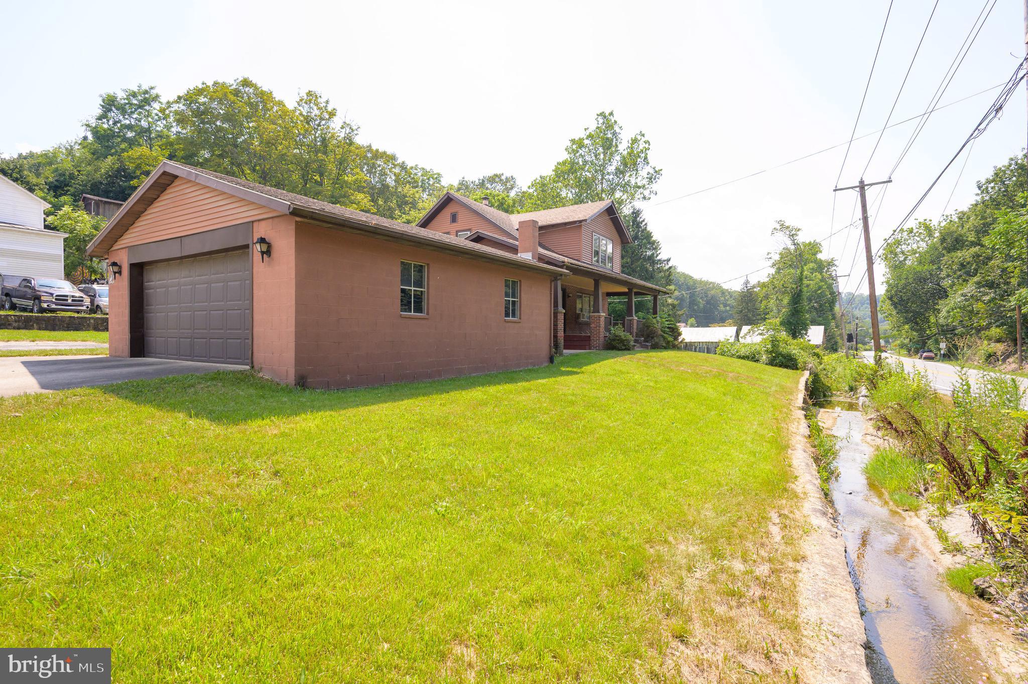 14 Peer Lane Berkeley Springs, WV 25411 - Photo 50 of 52 a view of a backyard with a garden