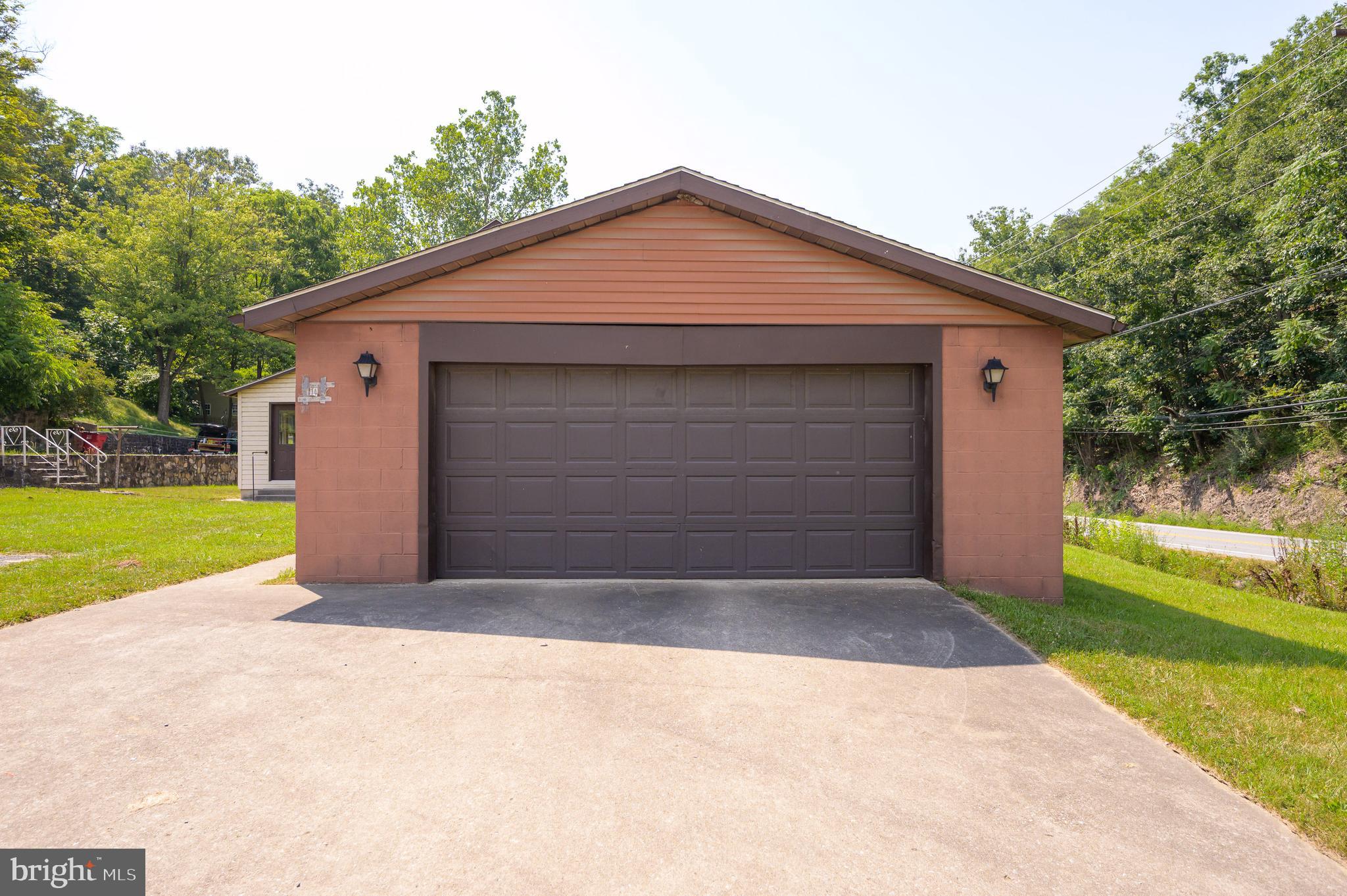 14 Peer Lane Berkeley Springs, WV 25411 - Photo 51 of 52 a front view of house with yard and green space