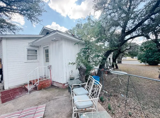 a view of a house with a patio