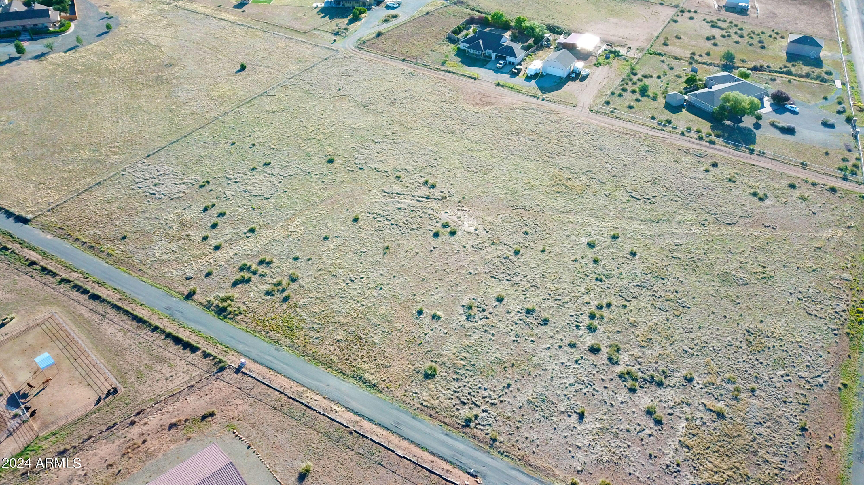 0 East Indigo Road, Unit 7 Prescott Valley, AZ 86315 - Photo 11 of 13 a view of wooden floor in a backyard