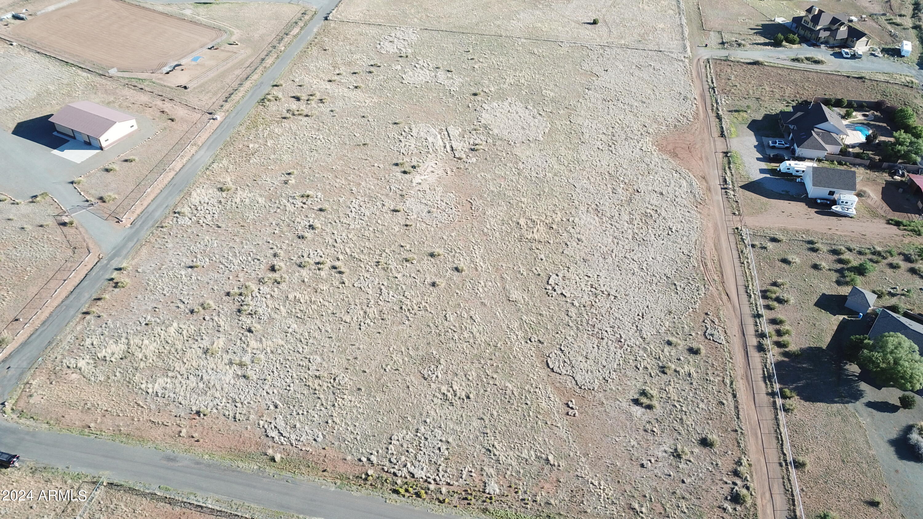 0 East Indigo Road, Unit 7 Prescott Valley, AZ 86315 - Photo 4 of 13 a bathroom with a shower curtain and a sink
