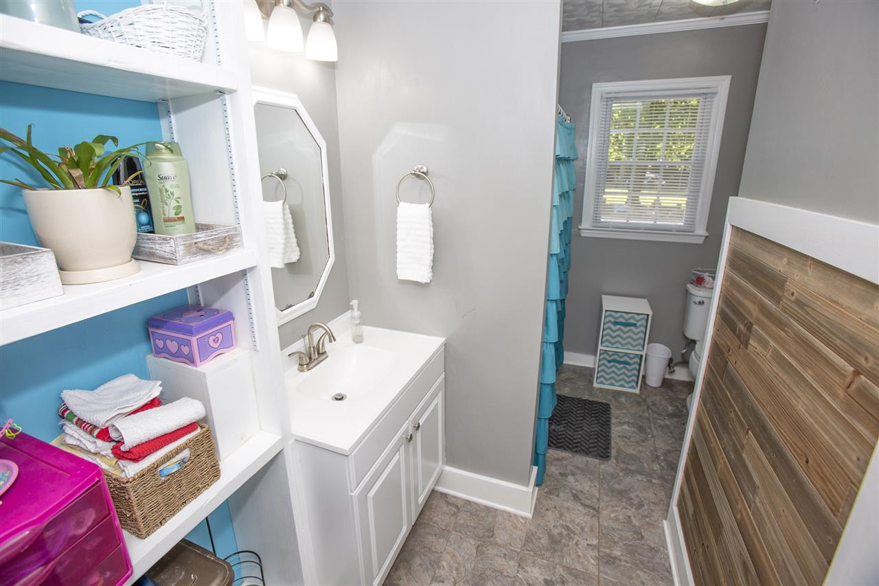 811 Lynn Road Durham, NC 27703 - Photo 16 of 18 Full Bath w/Shelving
