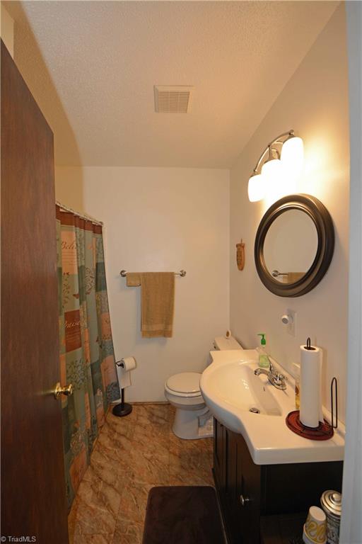 1351 Wilson Road Linwood, NC 27299 - Photo 22 of 35 Hall Bathroom