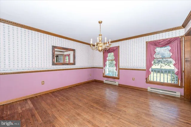 a view of empty room with painted walls