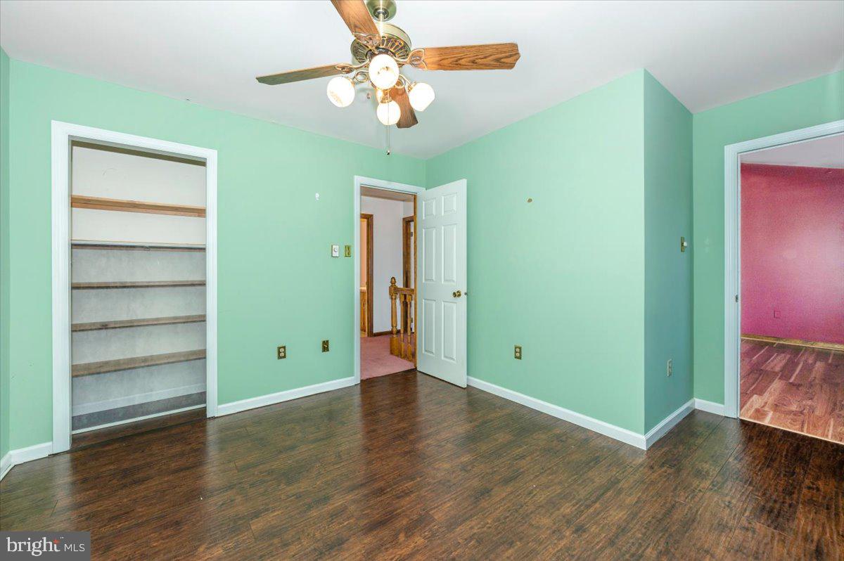 4 Shifflett Place Smithsburg, MD 21783 - Photo 38 of 57 wooden floor in an empty room with a window