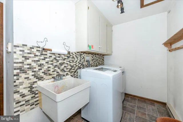 a view of a brick house with a large window