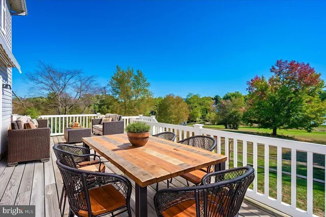 a view of a patio with wooden floor