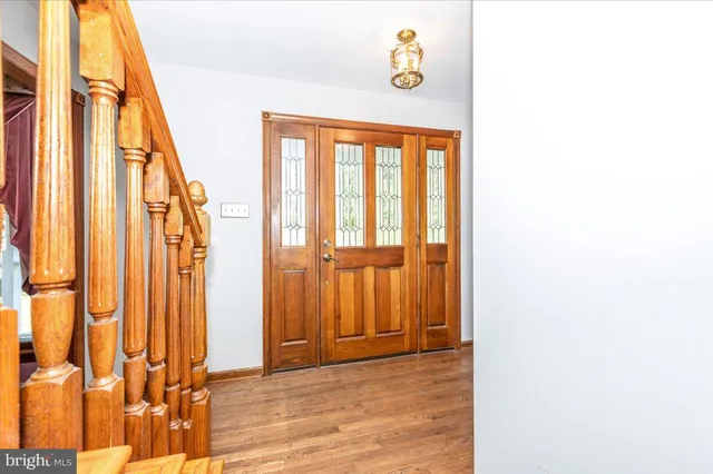 workspace with wooden floor and stairs
