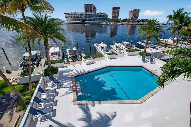 a row of pool table and chairs in patio