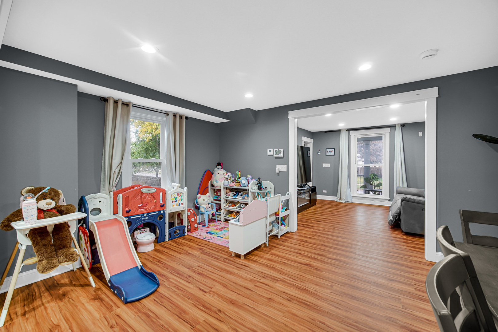 1521 Catalpa Street Waukegan, IL 60085 - Photo 13 of 22 a living room with furniture and a wooden floor