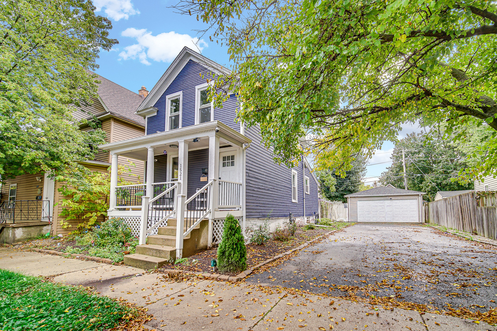 1521 Catalpa Street Waukegan, IL 60085 - Photo 4 of 22 front view of a house with a yard