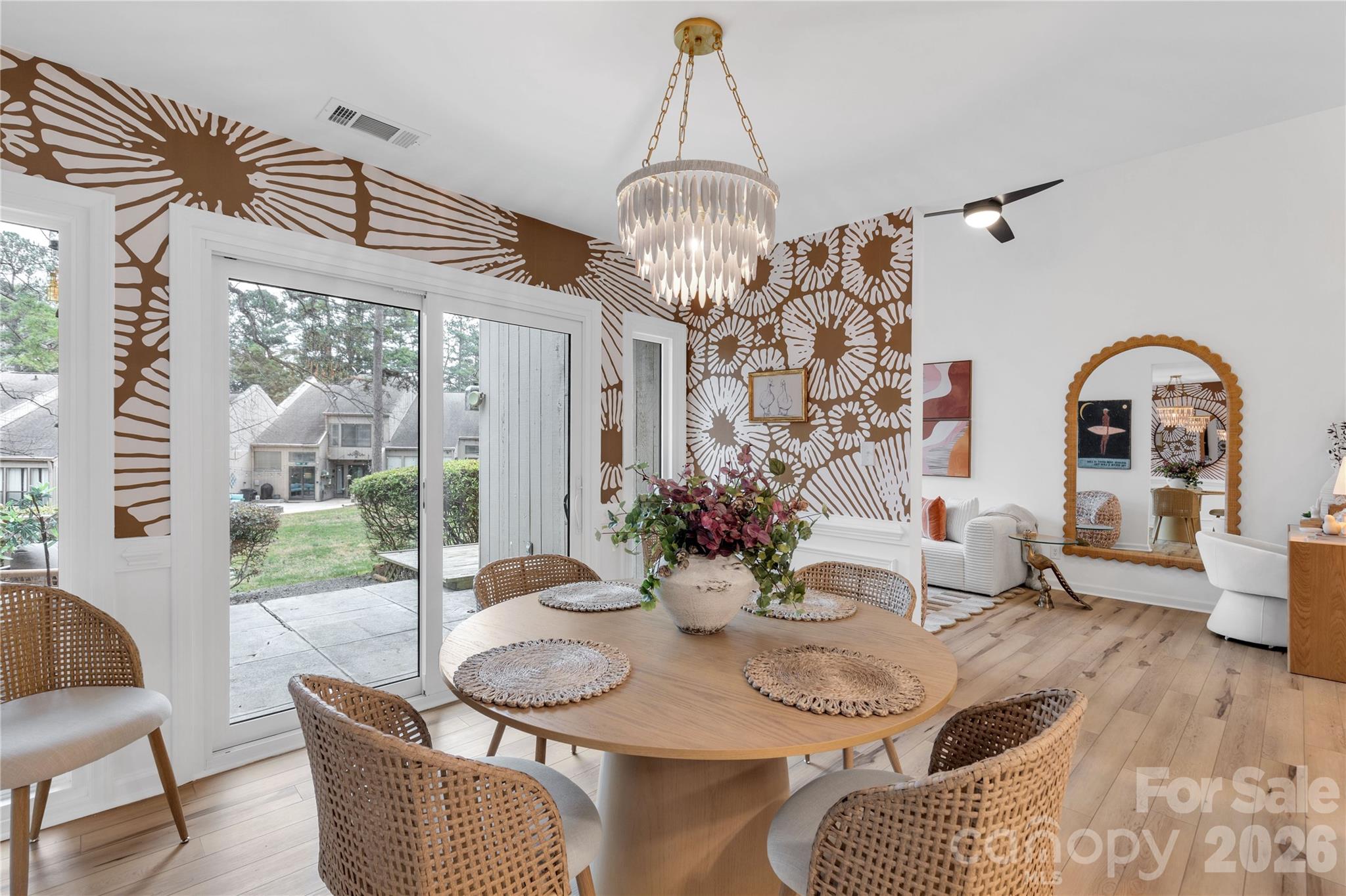 143 Greenridge Road Clover, SC 29710 - Photo 12 of 43 a view of a dining room with furniture wooden floor and chandelier