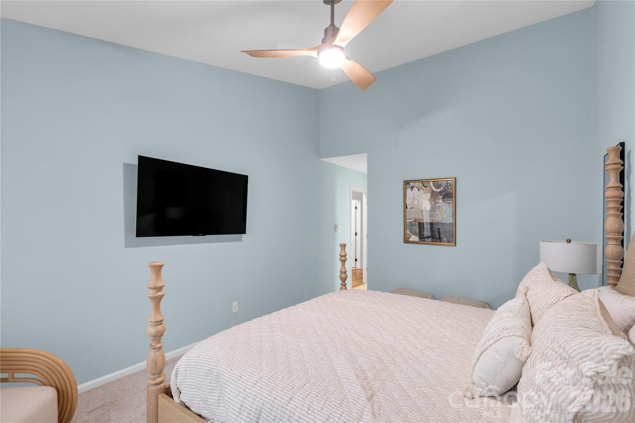 143 Greenridge Road Clover, SC 29710 - Photo 20 of 43 a bedroom with a bed and a flat screen tv