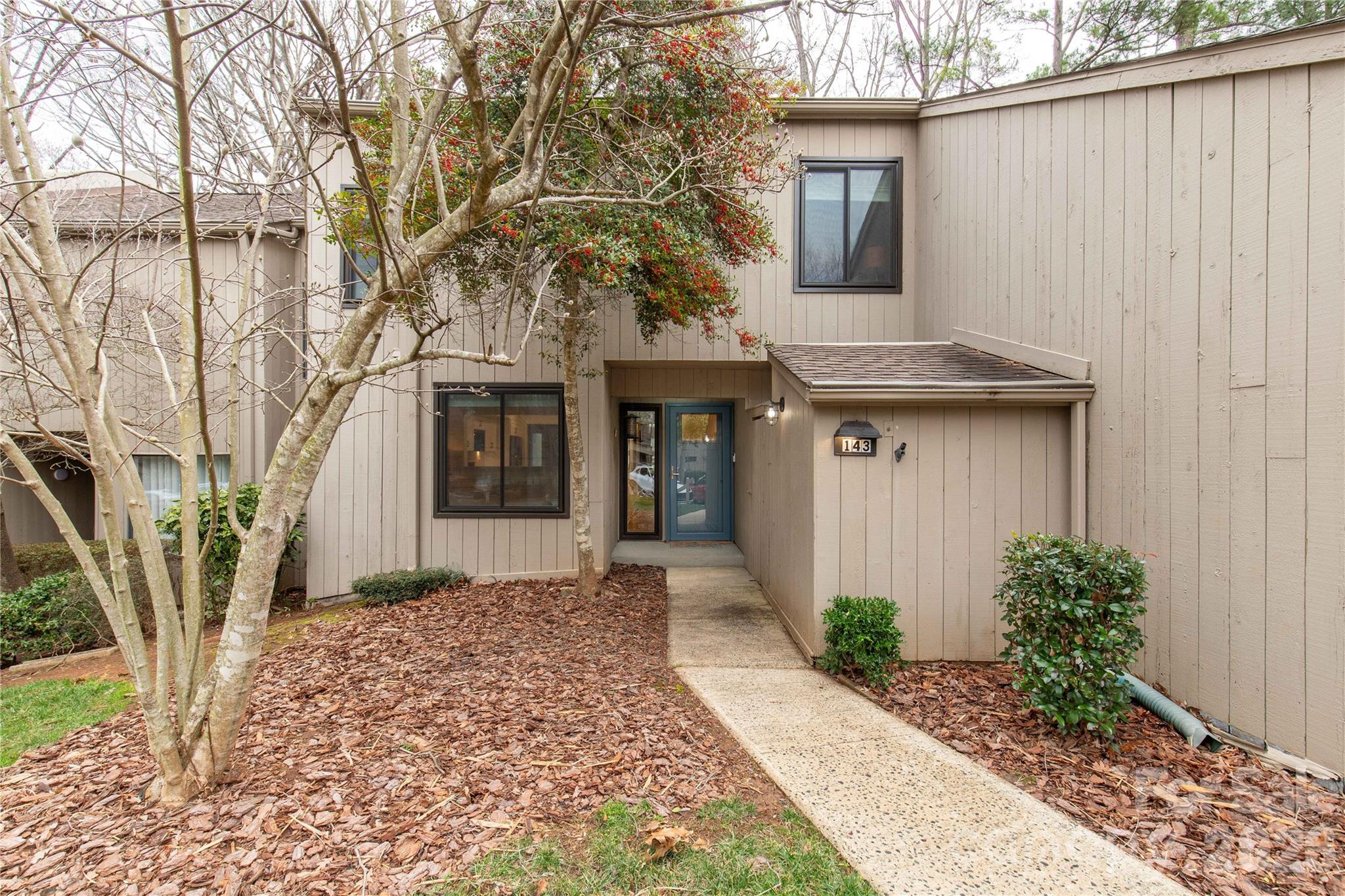 143 Greenridge Road Clover, SC 29710 - Photo 2 of 43 a front view of a house with garden