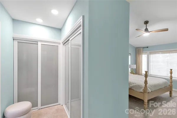 a view of a hallway with workspace