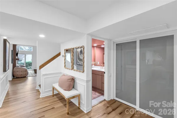 a living room with furniture and a rug