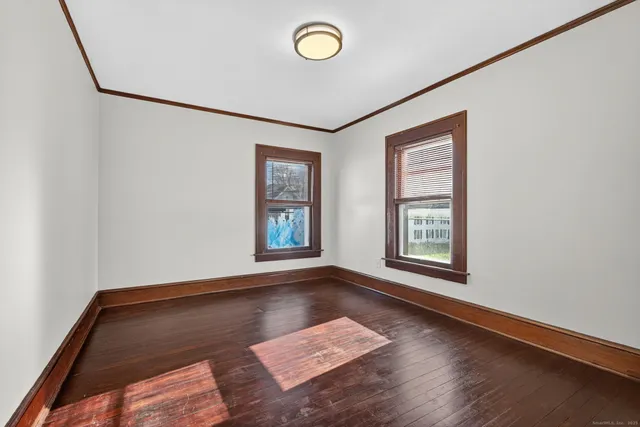 an empty room with windows