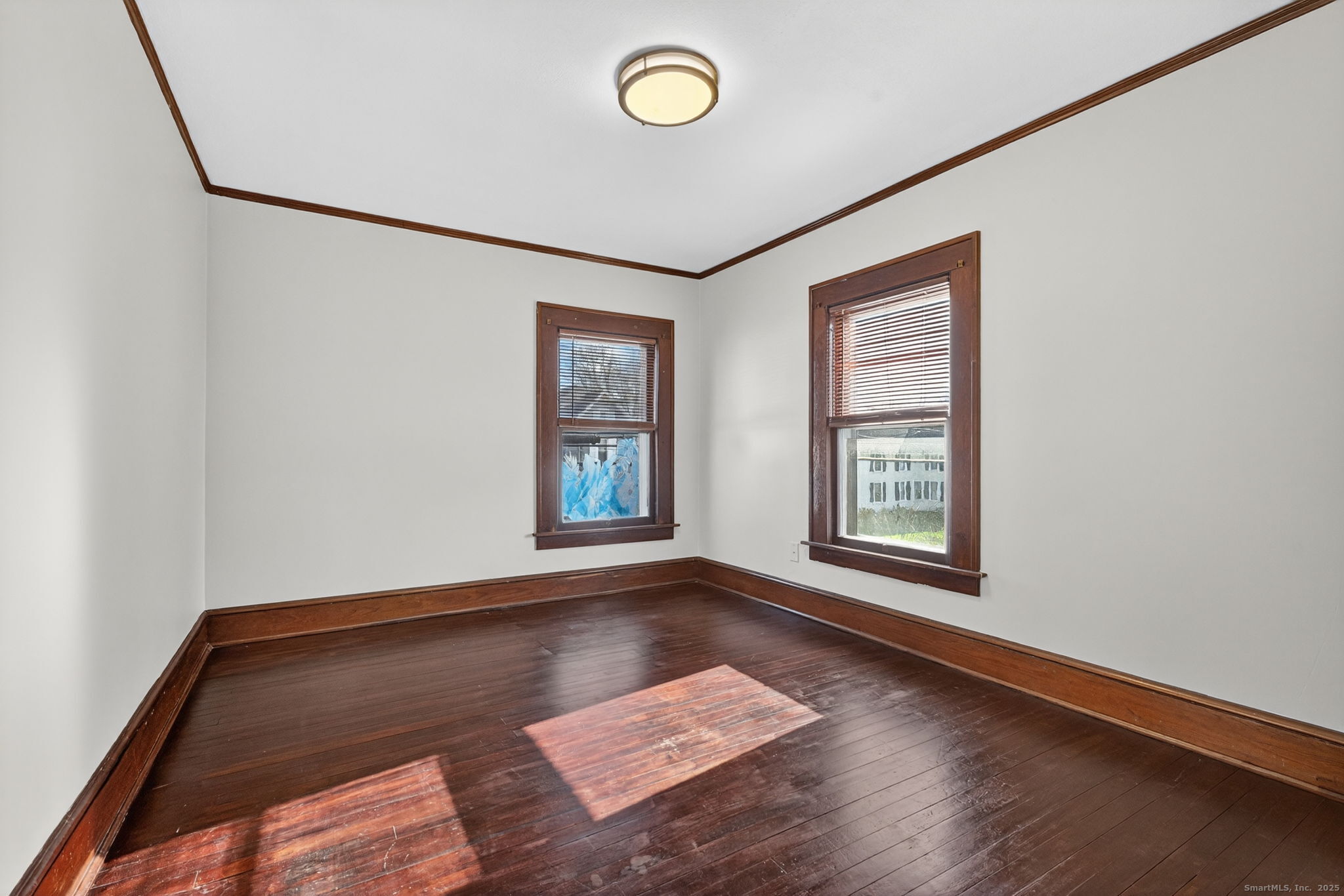 12 North Main Street Windsor Locks, CT 06096 - Photo 16 of 31 an empty room with windows