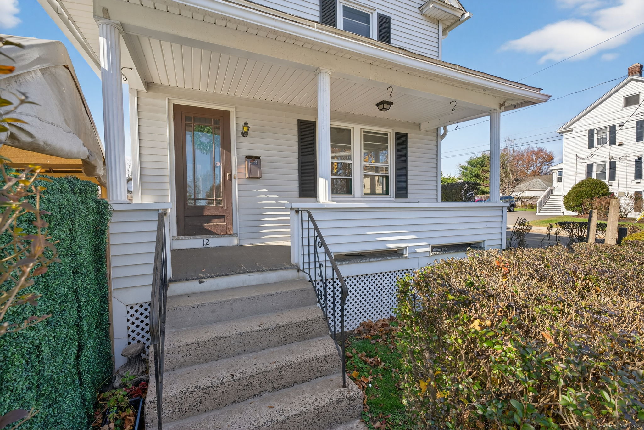 12 North Main Street Windsor Locks, CT 06096 - Photo 2 of 31 a view of a house with backyard and sitting area