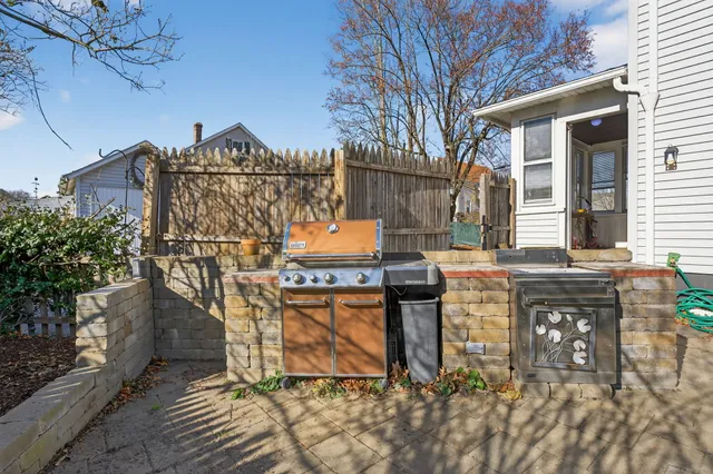 a view of a chairs and table in the patio