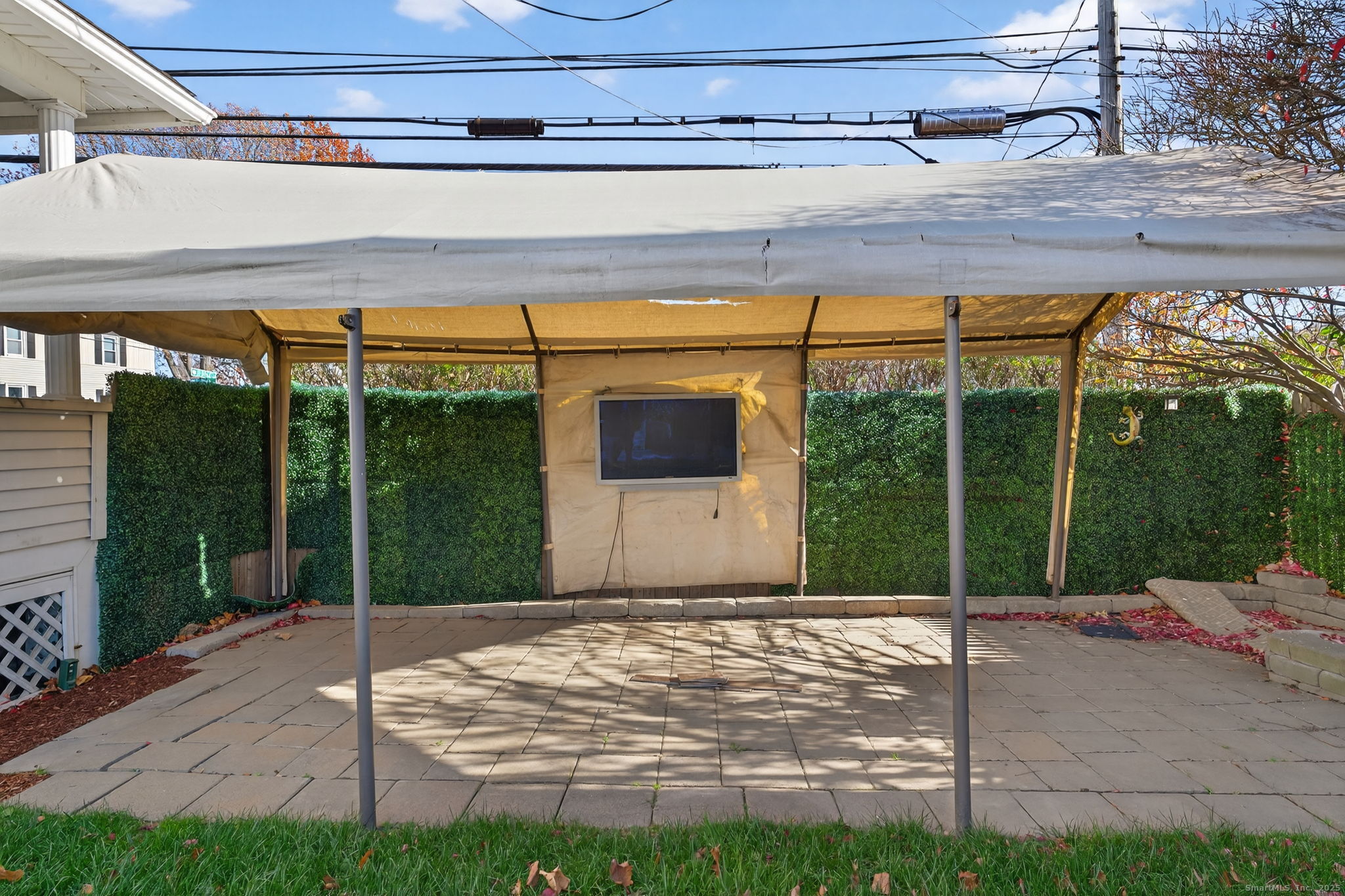12 North Main Street Windsor Locks, CT 06096 - Photo 25 of 31 a backyard of a house with lots of green space and glass windows