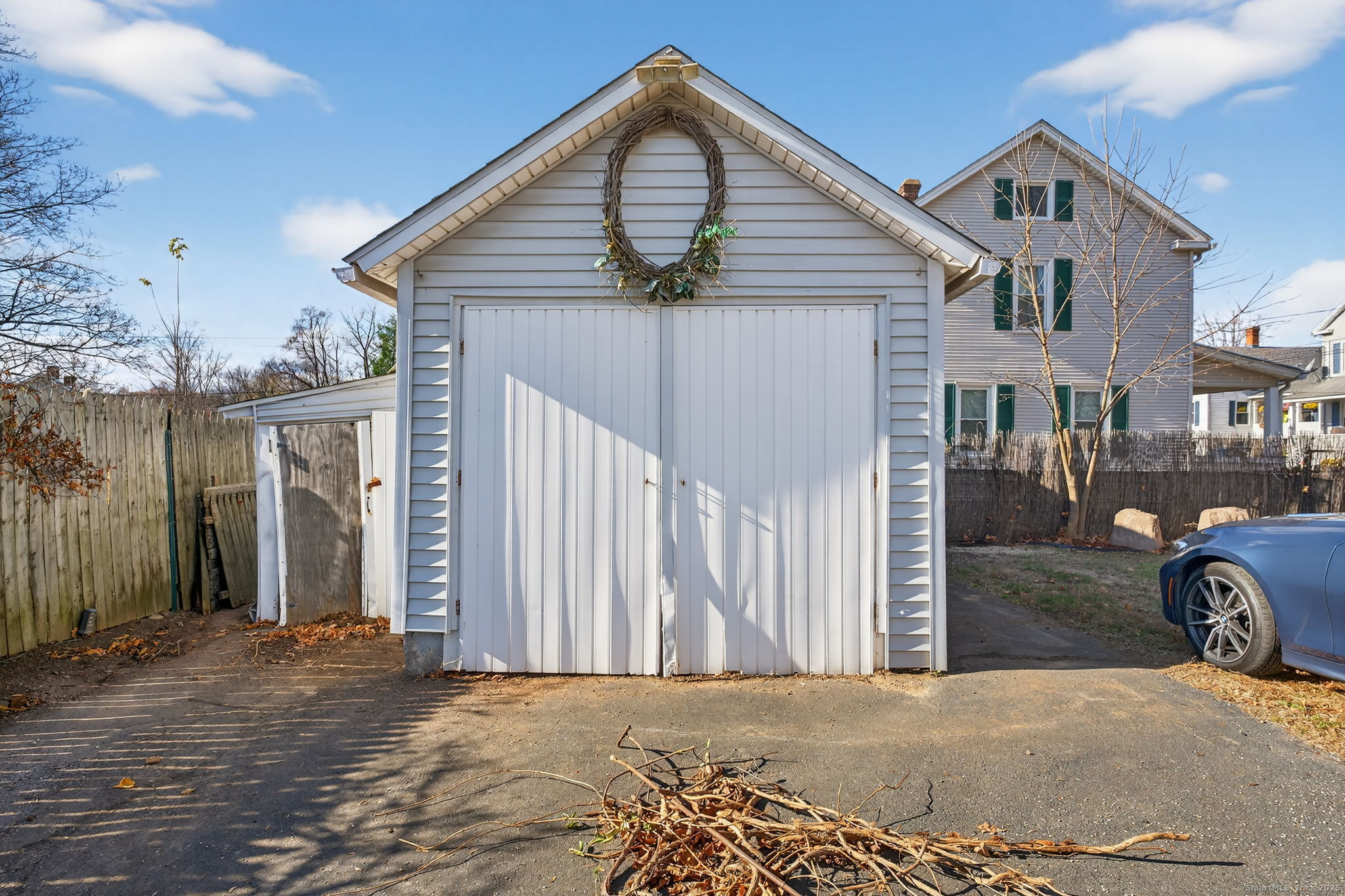 12 North Main Street Windsor Locks, CT 06096 - Photo 27 of 31 a front view of a house with parking area