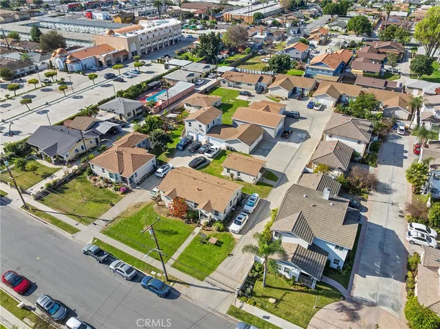 an aerial view of residential building with parking space