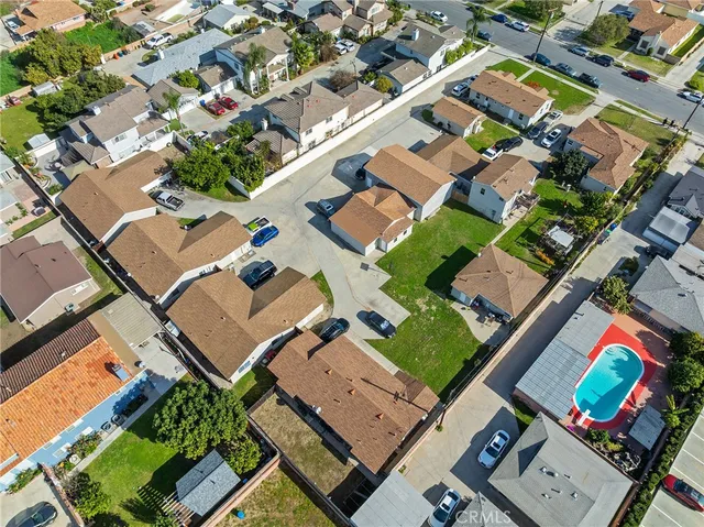 an aerial view of a city with lots of residential buildings