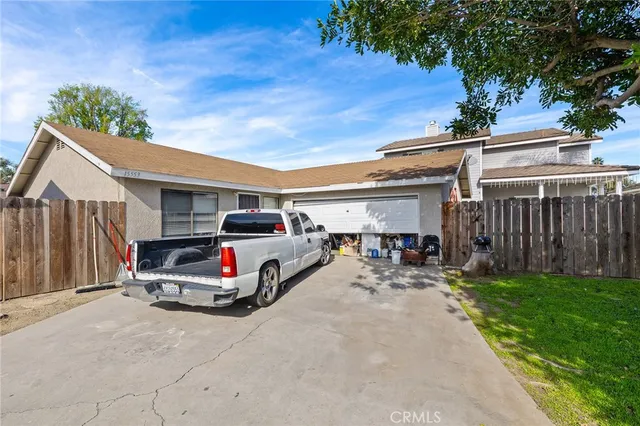 a car parked in front of a house